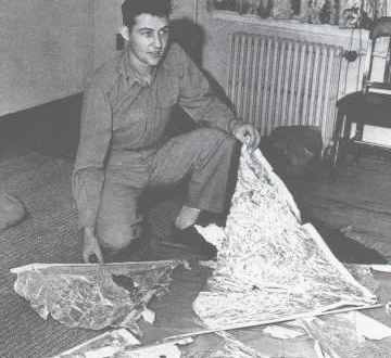 Major Jesse Marcel poses with a weather balloon